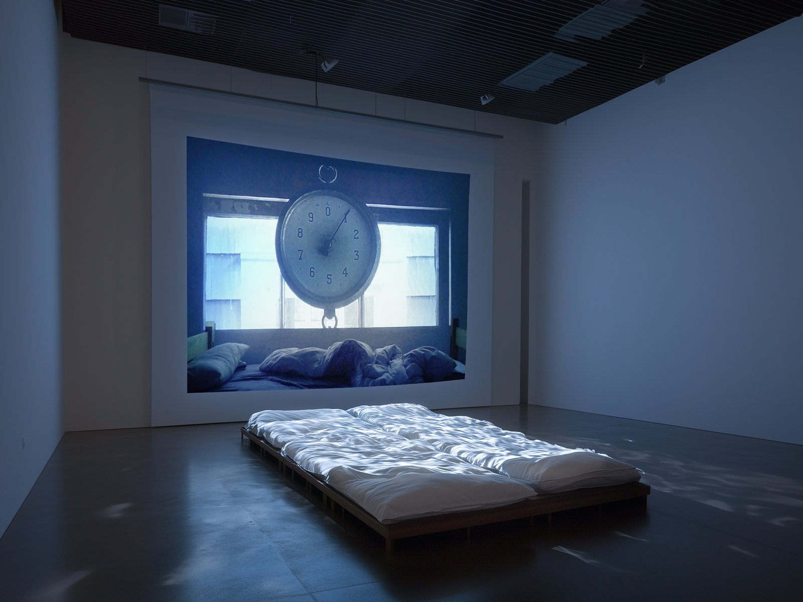 rainmelonzjy_72706_Video_InstallationA_bed_put_in_front_of_the__b50cb895-7d7a-4827-91c2-1b19cd2a441b-